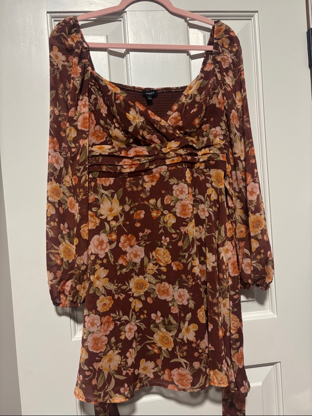 Blu Pepper Floral v-neck Long bubble sleeve dress. Elastic back and tie bow.
